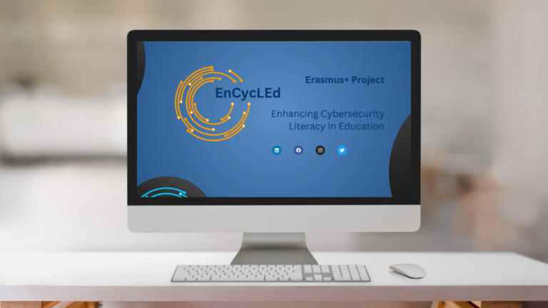 The picture shows a Computerscreen on a white desk with the Start-page of the EnCycLEd homepage.
